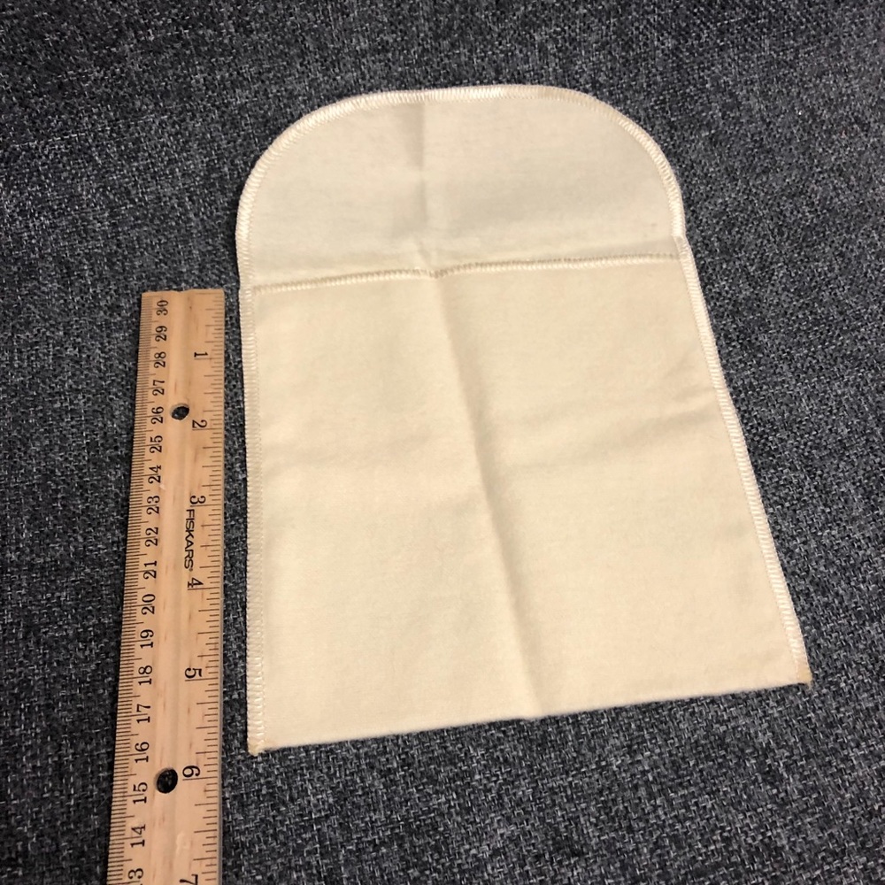 Large jewelry dust jacket. Free with purchase.*